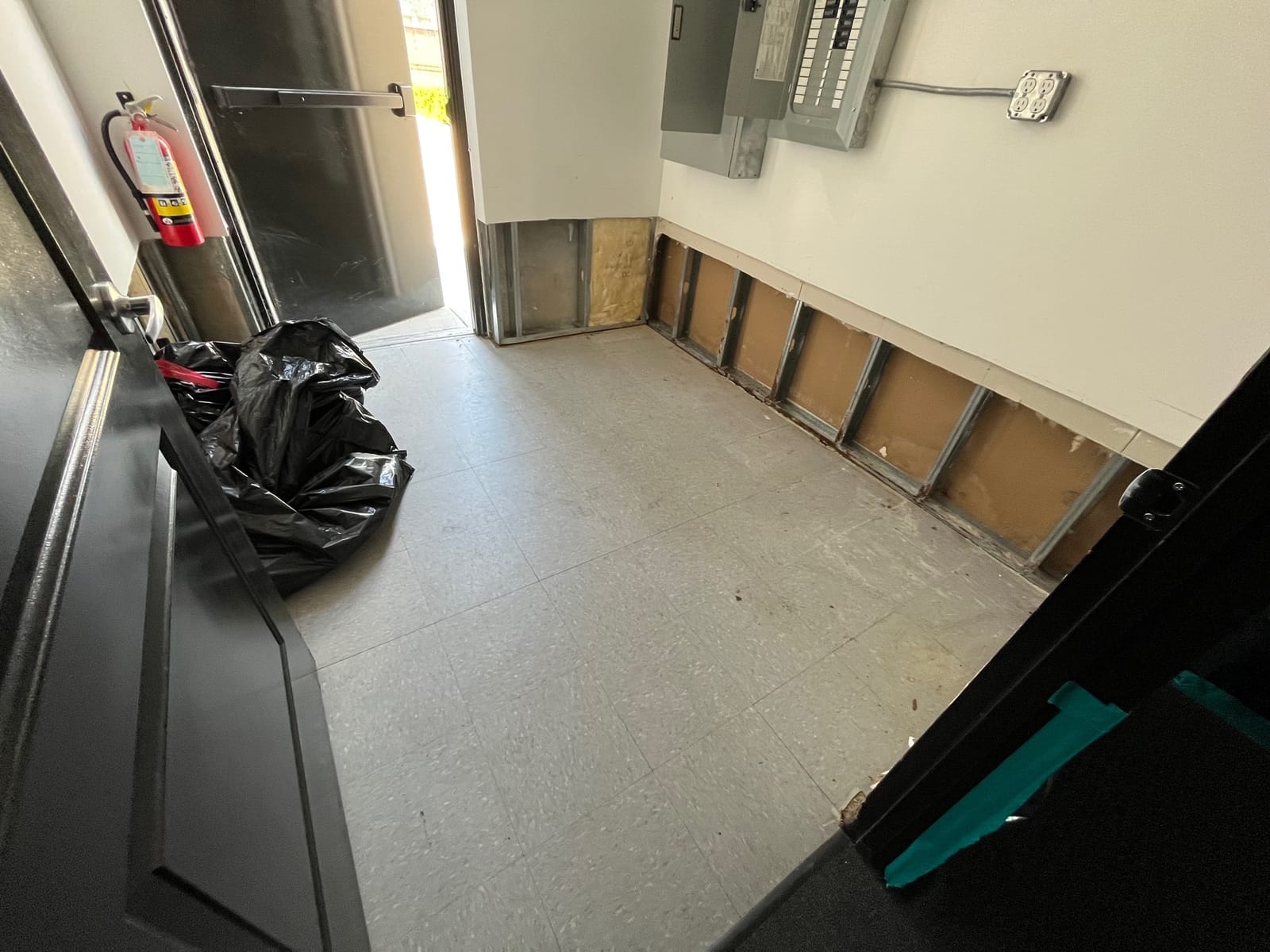 Interior commercial space undergoing water damage remediation